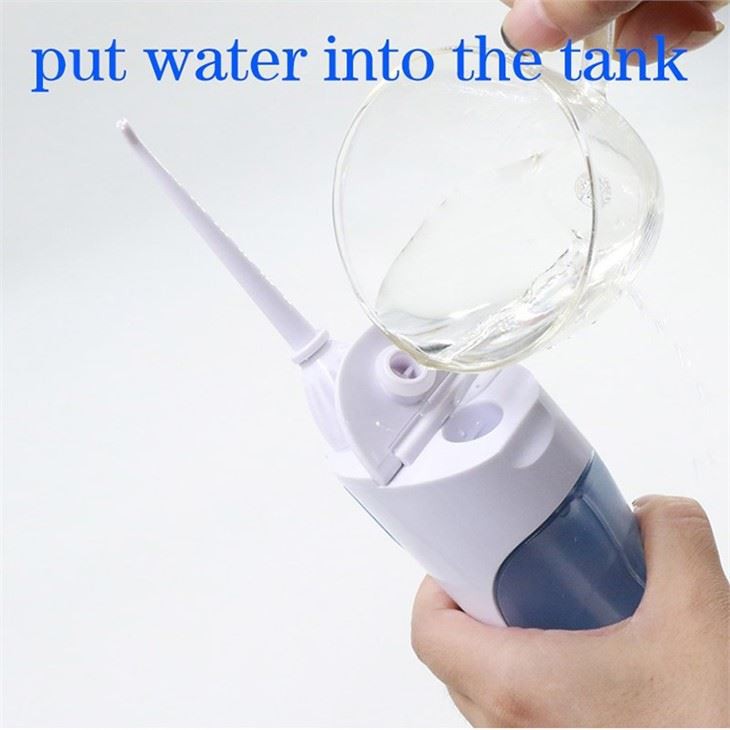 Bärbar oral irrigator